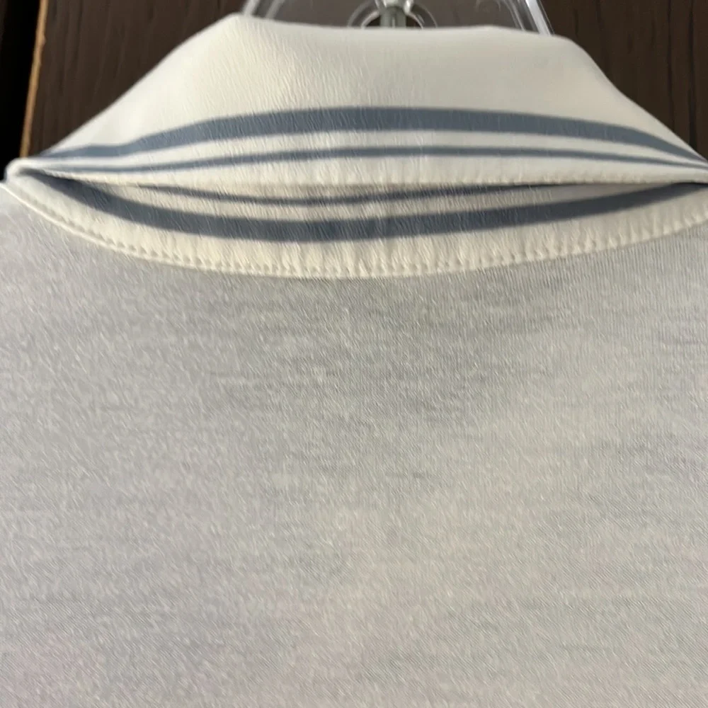 Ann Taylor long sleeved blouse. White with blue stripes and metal buttons. Sm